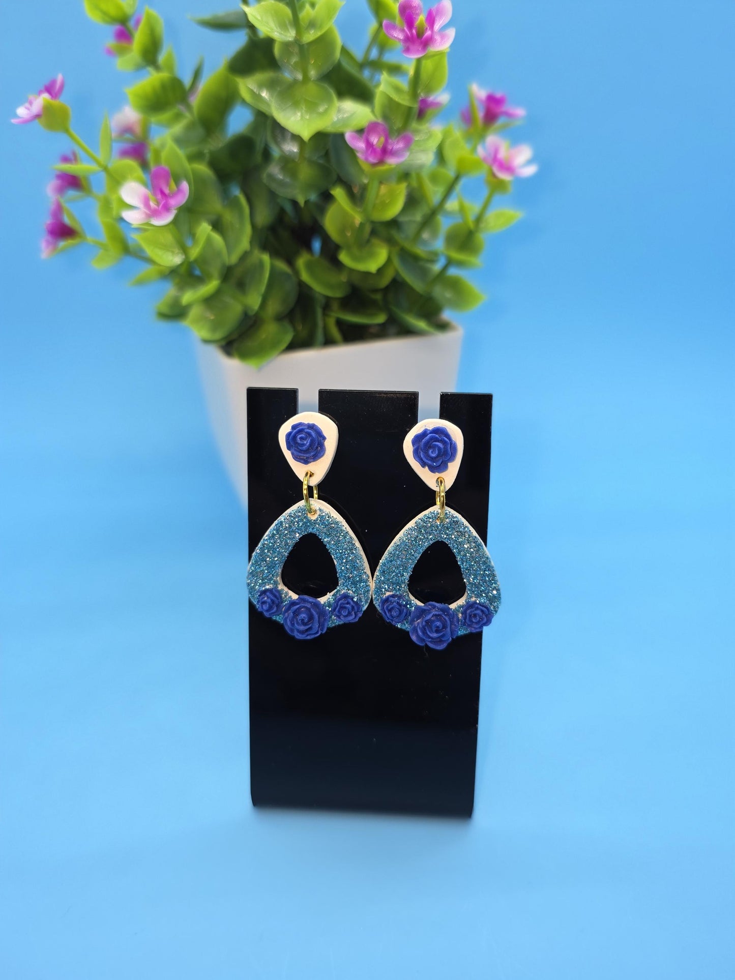 Blue Glitter Floral Drop Earrings – White Clay Base with Royal Rose Accents • Handmade Lightweight Dangles • No Resin