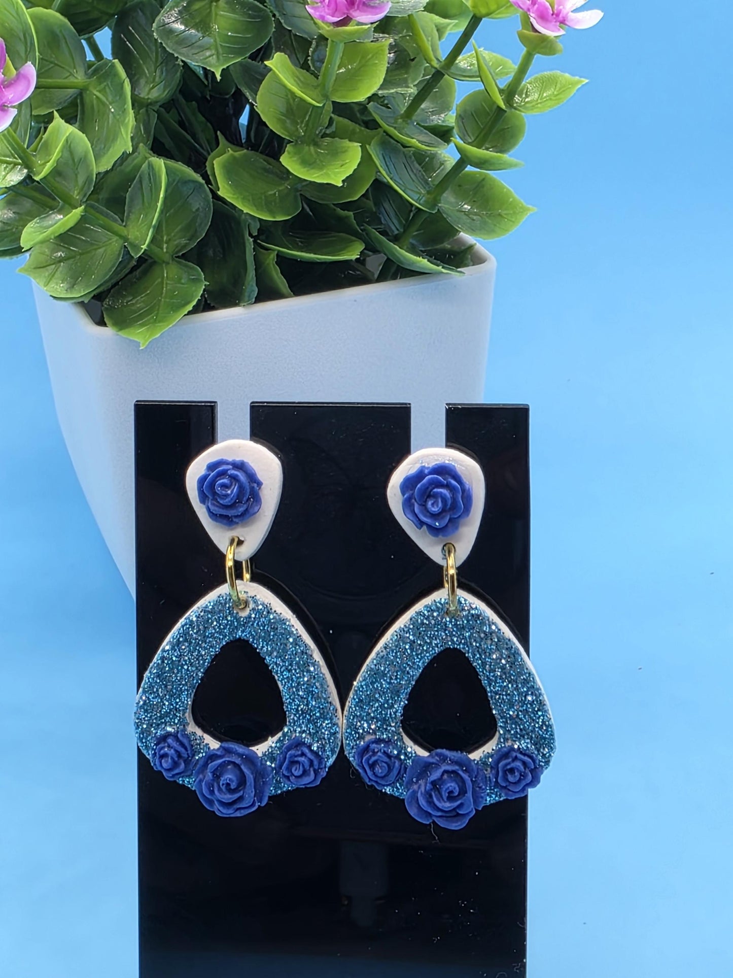 Blue Glitter Floral Drop Earrings – White Clay Base with Royal Rose Accents • Handmade Lightweight Dangles • No Resin